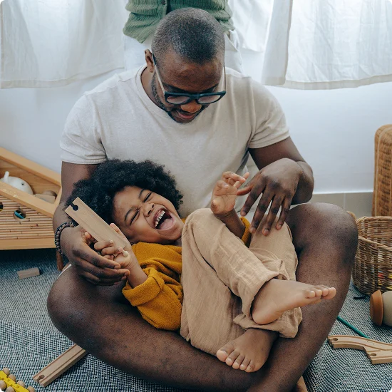 Father with child playing